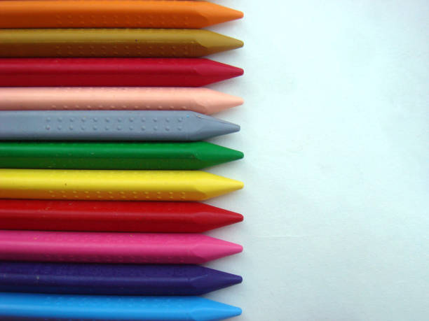 istock Crayons colors on white paper 658404516