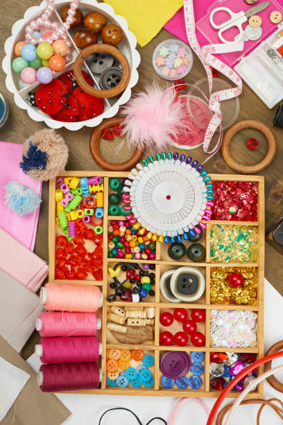 istock embroidery and sewing accessories top view, seamstress workplace, many object for needlework, handmade and handicraft 658407488