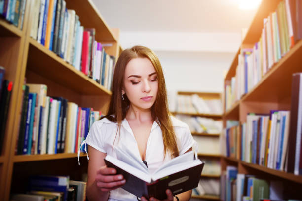 istock Brunette girl at library 658408182