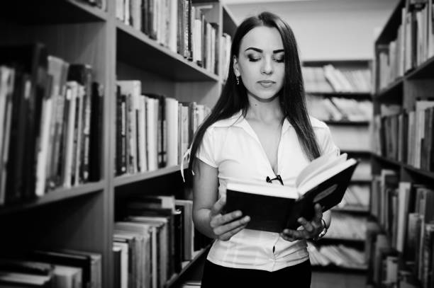 istock Brunette girl at library 658408210