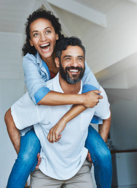 istock She's got him at her beck and call 658408314