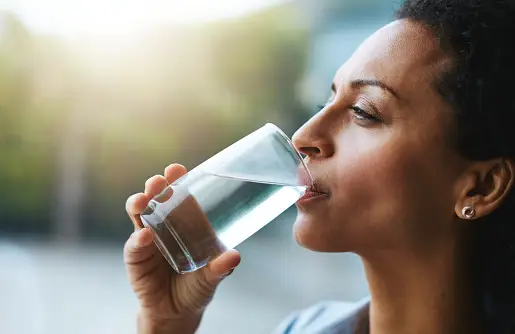 Person Drinking Alkaline Water