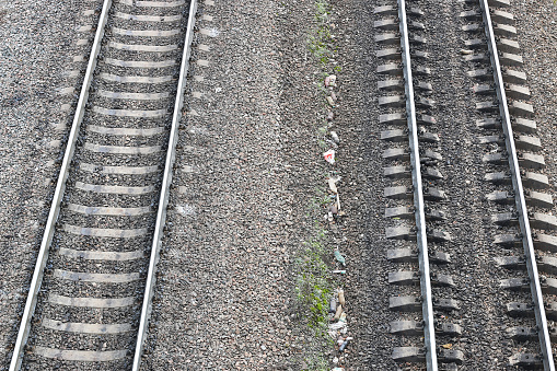 railway rails and stones background top view