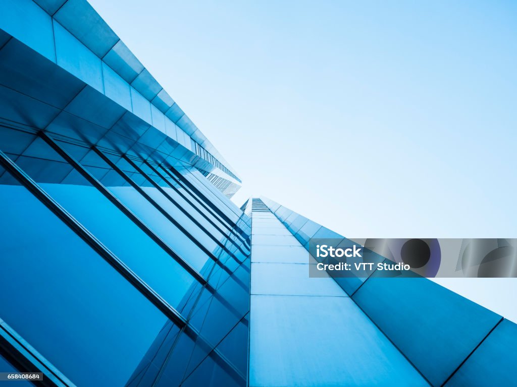 Detalles de la arquitectura de diseño de la fachada de vidrio del edificio moderno - Foto de stock de Arquitectura exterior libre de derechos