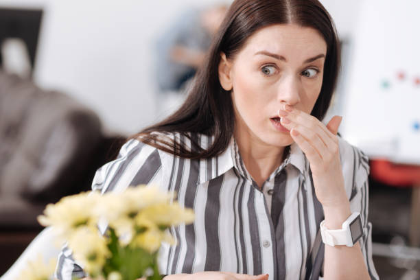 istock Surprised young woman looking aside 658413062