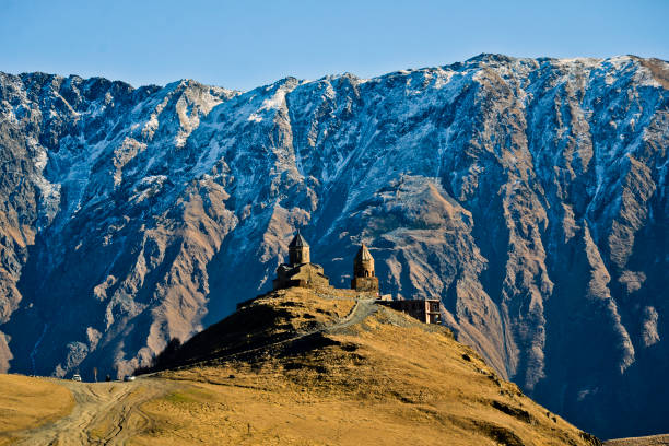 istock Gergeti Trinity Church Kazbegi Georgia 658413068