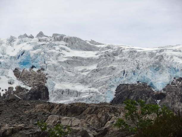 istock Beautiful Buarbreen glacier with grey sky near Odda in Norway 658422610