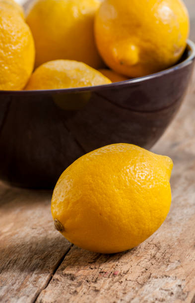 istock Lemon on old wooden background. 658422746