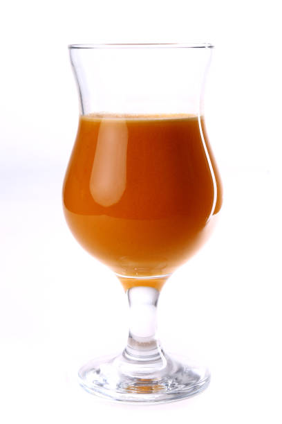 istock Glass of the brown juice 658422768