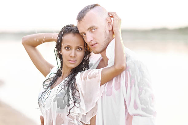 istock beautiful Couple in love on summer beach 658426088