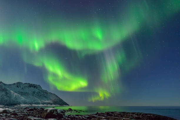 istock Aurora Northern Polar light in night sky over Northern Norway 658426788