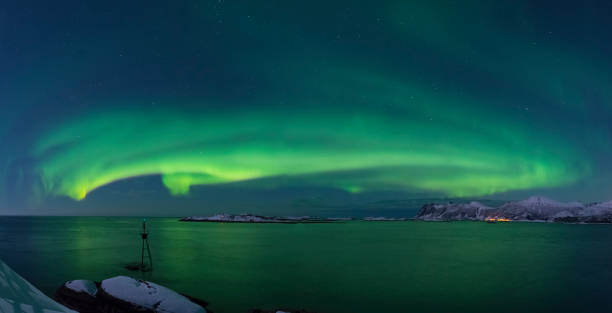 istock Aurora Northern Polar light in night sky over Northern Norway 658427208