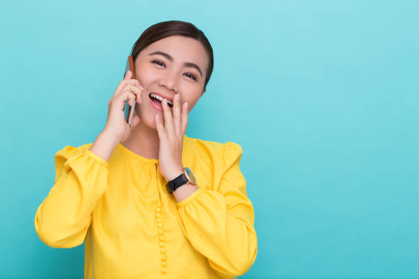 istock Woman calling the smartphone and she feel happy 658447802