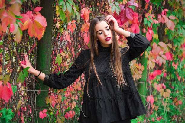 istock Beautiful model posing in autumn park 658451832