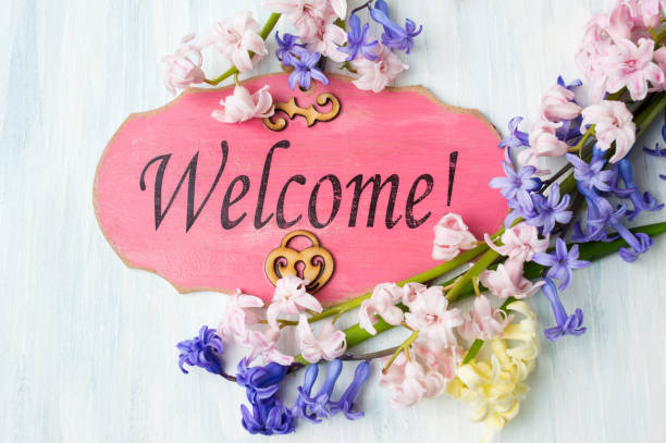 Welcome note and colorful hyacinth flowers arrangement