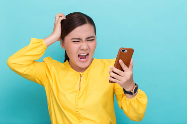 istock Woman shouting to the smartphone 658455762