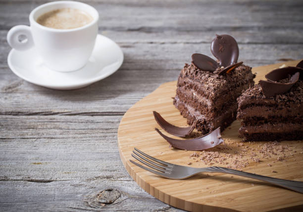 istock Chocolate cake on old wooden table 658457050