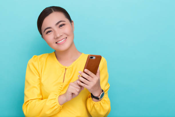 istock Woman use the smartphone and she feel happy 658459026