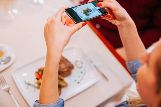 istock A Young Woman Taking A Photo 658461722