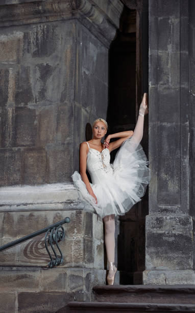istock Beautiful ballet woman on stairs 658463062