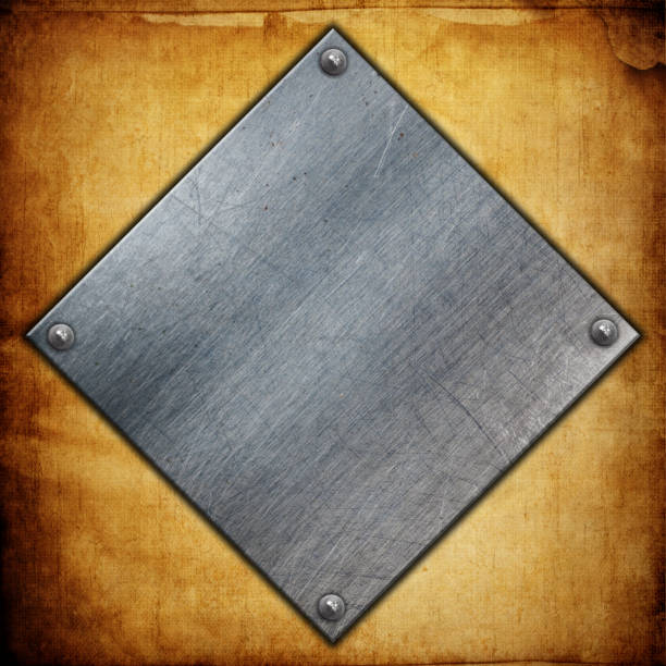 istock Metal plates on grunge paper background 658468710