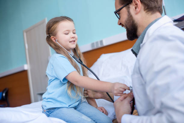 istock Doctor and little patient 658472268