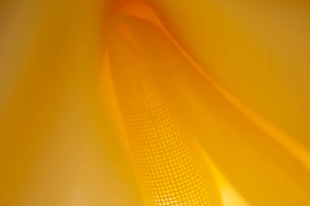 istock wrinkled yellow fabric 658472512