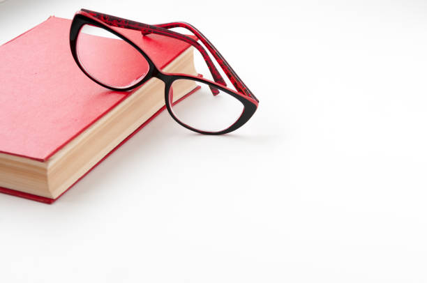 istock Red book and glasses on a light background 658477164
