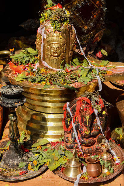istock Temple statues with sacrificial offerings, Manakamana Temple 658481040