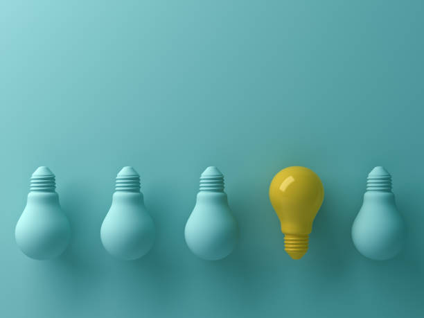 istock Think different concept , One yellow light bulb standing out from the unlit green incandescent lightbulbs with reflection and shadow , leadership and different creative idea concept. 3D render 658483700