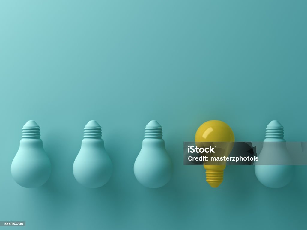 Think different concept , One yellow light bulb standing out from the unlit green incandescent lightbulbs with reflection and shadow , leadership and different creative idea concept. 3D render Think different concept , One yellow light bulb standing out from the unlit green incandescent lightbulbs with reflection and shadow , leadership and different creative idea concept. 3D rendering. Individuality Stock Photo