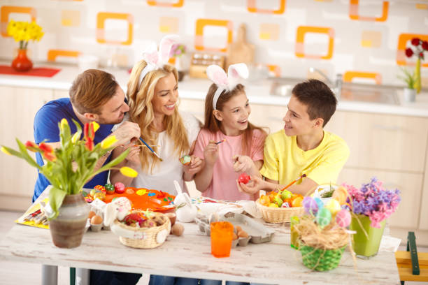 istock Boy show to family first red egg 658488054