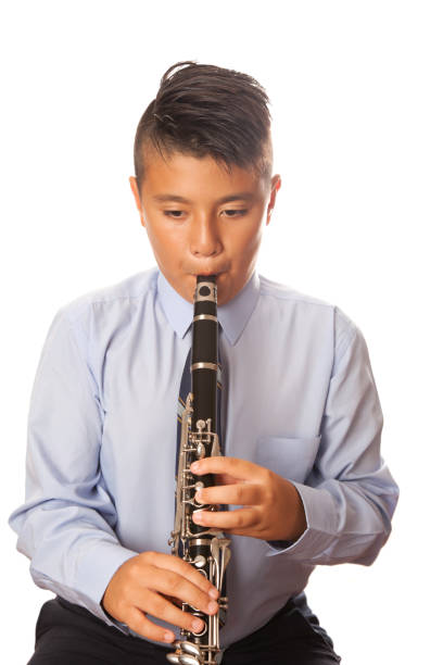 clarinete de play boy - musician clarinet teenager asian ethnicity fotografías e imágenes de stock