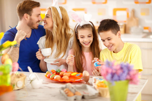 istock Family together prepare Easter celebration 658490994