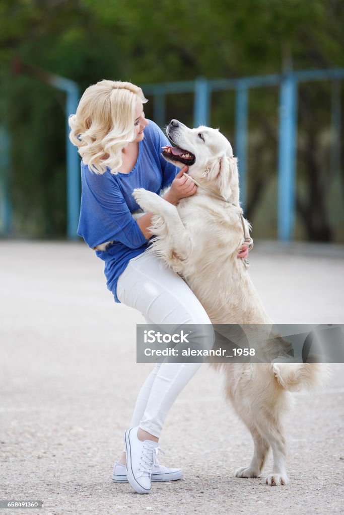Young Beautiful Blonde With The Dog Breed Golden Retriever Stock Photo - Download Image Now - iStock Young Beautiful Blonde With The Dog Breed Golden Retriever Stock Photo - Download Image Now - iStock