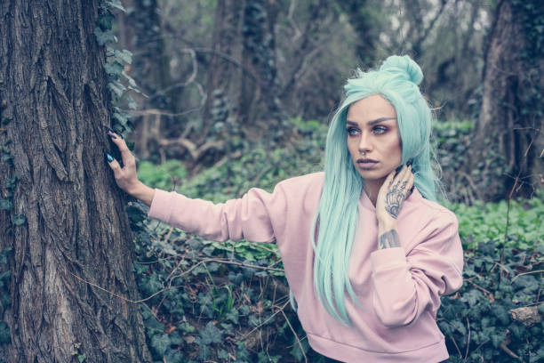 istock Girl with mint wig outdoor. 658491402