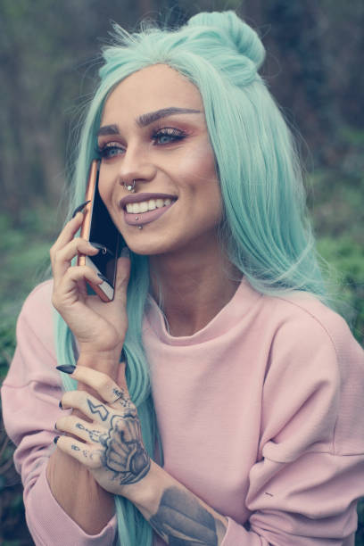 istock Girl with mint wig outdoor. 658494308