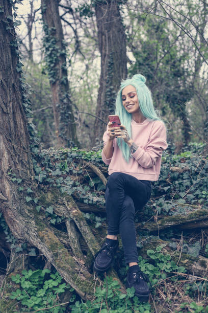 istock Girl with mint wig outdoor. 658494462