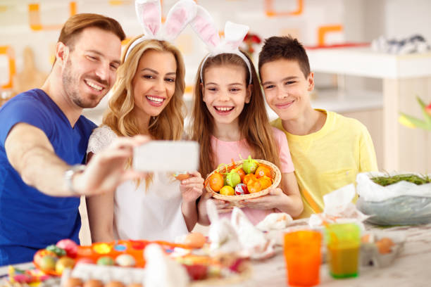 istock Family make selfie with basket of Easter eggs 658495940