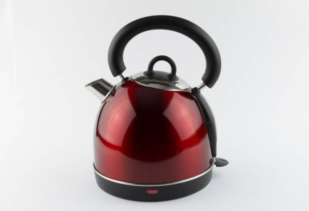 istock Beautiful design sleek red modern electric water boiler kitchen kettle isolated on white background 658495950