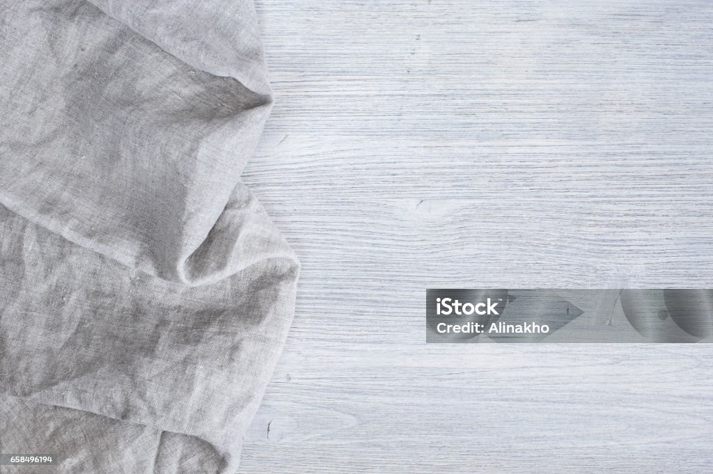 Wooden gray background with linen napkin Linen Stock Photo