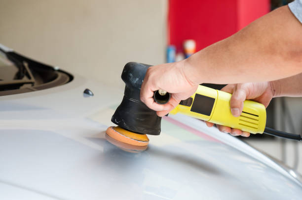 istock Hands with orbital polisher 658501096