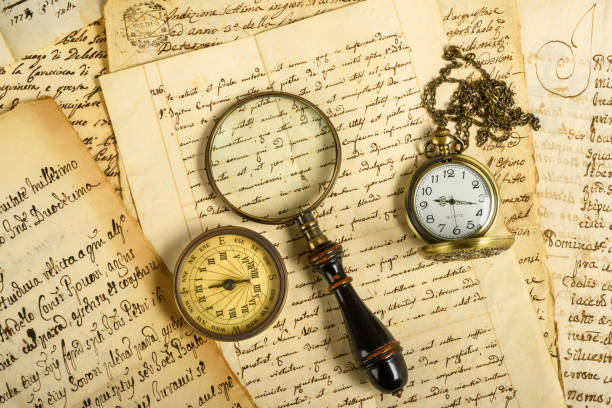 istock pocketwatch compass and magnifying glass 658505304
