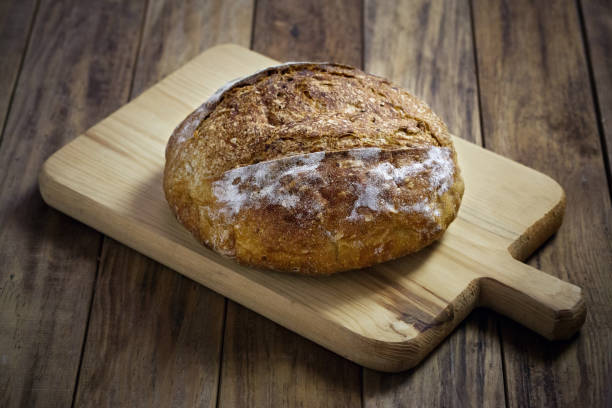 istock Load of bread on cutting board 658510236