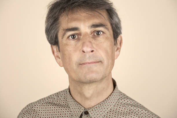 istock Tanned Italian man looks perplexed a the camera 658516804