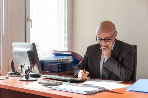 istock Businessman working at desk 658527448