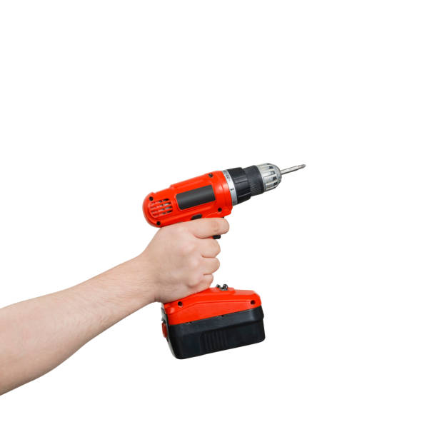 istock Hand Holding a Cordless Electric Screwdriver with Clipping Path 658531258