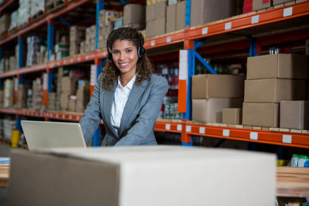 istock Business woman is talking with a headset 658535092