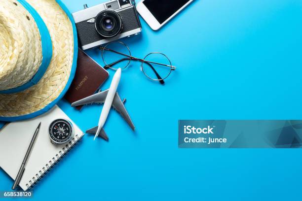 Travel Accessories With Copy Space On Blue Background Stock Photo - Download Image Now