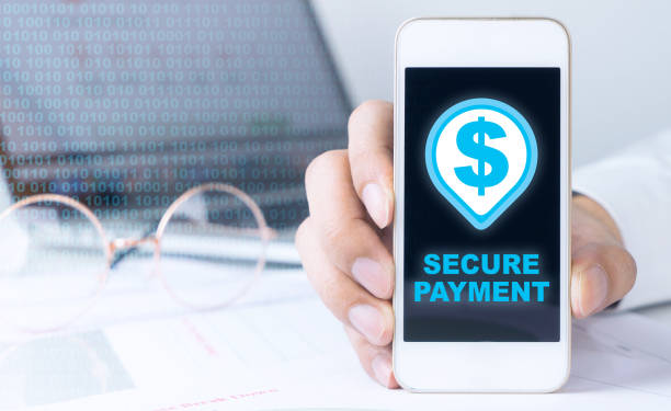 istock Business man showing a secured payment transaction on his mobile 658538246